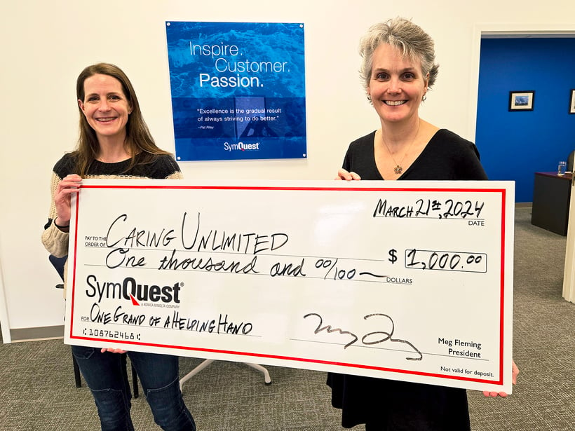 Caring Unlimited Receives Check for SymQuest Westbrook Ribbon Cutting