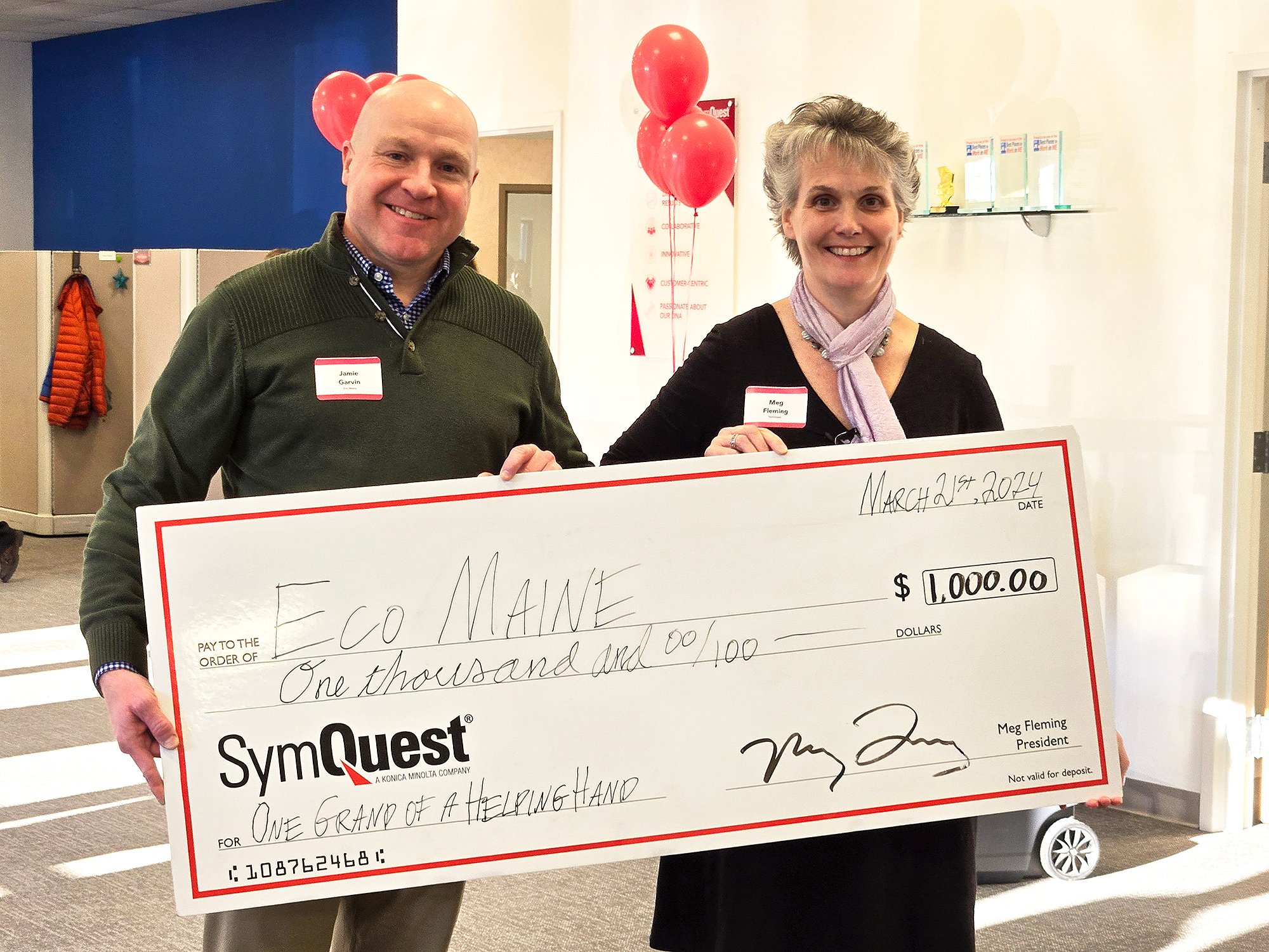 Eco Maine Receives Check at SymQuest Westbrook Ribbon Cutting