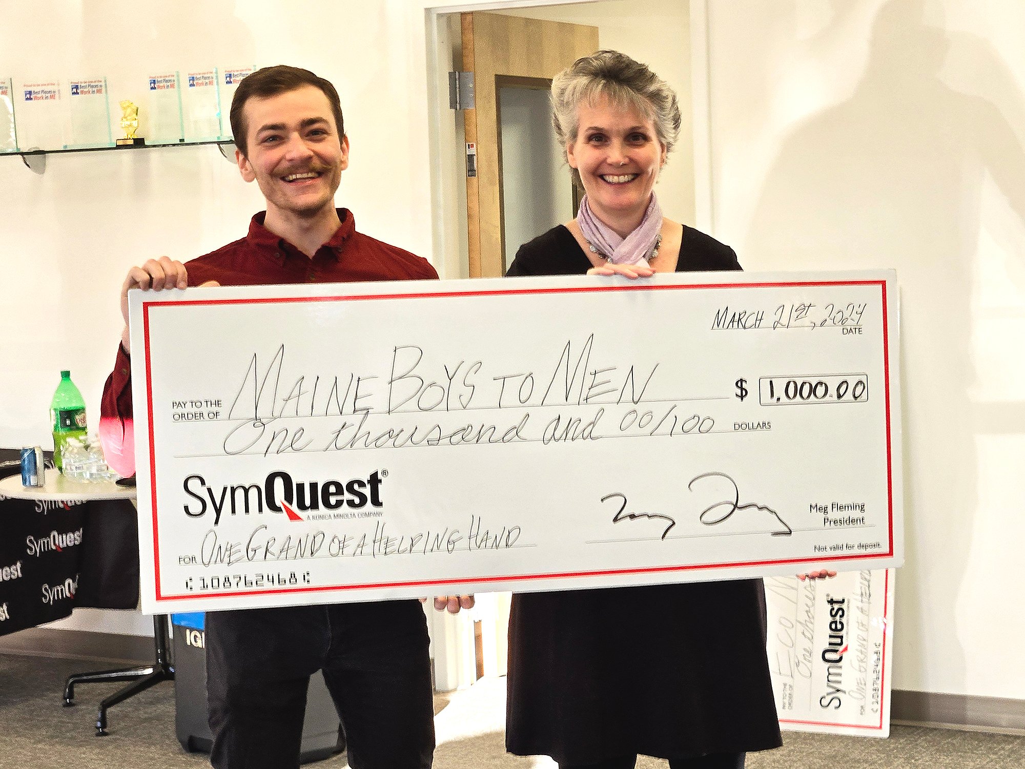 Maine Boys to Men Receives Check at SymQuest Westbrook Ribbon Cutting